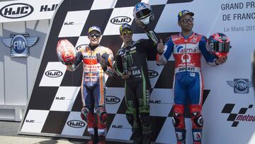 LE MANS, FRANCE - MAY 19: (L-R) Marc Marquez of Spain and Repsol Honda Team;  Johann Zarco of France and Monster Yamaha Tech 3 and Danilo Petrucci of Italy and  Pramac Racing celebrate at the end of the qualifying practice during the MotoGp of France - Qualifying on May 19, 2018 in Le Mans, France.  (Photo by Mirco Lazzari gp/Getty Images)