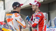 VALENCIA, SPAIN - NOVEMBER 09:  Andrea Dovizioso of Italy and Ducati Team (R) pose with Marc Marquez of Spain and Repsol Honda Team in pit during the photo opportunity between Marc Marquez and Andrea Dovizioso on their bikes during the Comunitat Valenciana Grand Prix - Moto GP Previews at Comunitat Valenciana Ricardo Tormo Circuit on November 9, 2017 in Valencia, Spain.  (Photo by Mirco Lazzari gp/Getty Images)