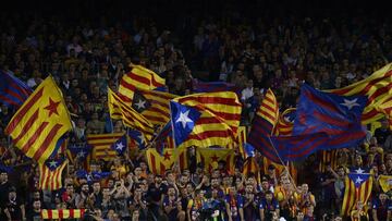 Barcelona&#039;s fans wave &#039;Esteladas&#039; (pro-independence Catalan flags) before the UEFA Champions League Group D football match FC Barcelona vs Juventus at the Camp Nou stadium in Barcelona