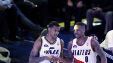 Trey Burke y Damian Lillard celebran la victoria en el concurso de habilidades. 