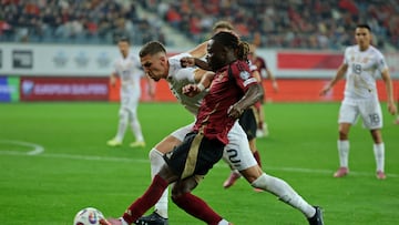 Soccer Football - FIFA World Cup - UEFA Qualifiers - Group J - Belgium v North Macedonia - KAA Gent Stadium, Ghent, Belgium - October 10, 2025 Belgium's Jeremy Doku in action with North Macedonia's Andrej Stojchevski REUTERS/Yves Herman