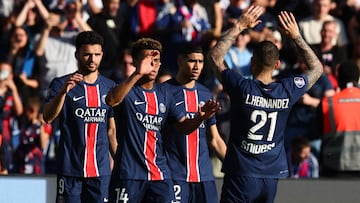 Soccer Football - Ligue 1 - Paris St Germain v Angers - Parc des Princes, Paris, France - April 5, 2025 Paris St Germain's Desire Doue celebrates scoring their first goal with teammates REUTERS/Gonzalo Fuentes