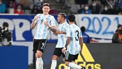 Argentina forward Adolfo Gaich (L) celebrates his goal with teammates during their Under-24 international friendly football match against Japan at Ajinomoto Stadium in Tokyo on March 26, 2021. (Photo by Kazuhiro NOGI / AFP)