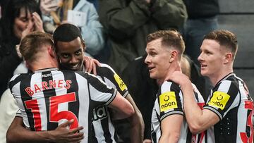 Newcastle United's Swedish striker #14 Alexander Isak (2nd L) celebrates after scoring his team first goal during the English Premier League football match between Newcastle United and Everton at St James' Park in Newcastle-upon-Tyne, north east England on April 2, 2024. (Photo by Andy Buchanan / AFP) / RESTRICTED TO EDITORIAL USE. No use with unauthorized audio, video, data, fixture lists, club/league logos or 'live' services. Online in-match use limited to 120 images. An additional 40 images may be used in extra time. No video emulation. Social media in-match use limited to 120 images. An additional 40 images may be used in extra time. No use in betting publications, games or single club/league/player publications. / 