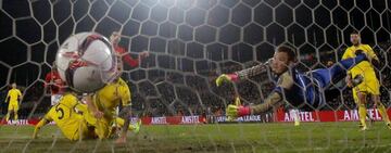 Henrikh Mkhitaryan slots the opener against Rostov.