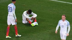 NICE, FRANCE - JUNE 27: Wayne Rooney of England walks from the pitch as Dele Alli and Daniel Sturridge show their dissapointment after defeat during the UEFA Euro 2016 Round of 16 match between England and Iceland at Allianz Riviera Stadium on June 27, 2016 in Nice, France.  (Photo by Laurence Griffiths/Getty Images)
