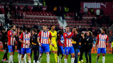 Girona's players celebrate victory at the end of the Spanish league football match between Girona FC and Deportivo Alaves at the Montilivi stadium in Girona on December 18, 2023. Girona won 3-0. (Photo by Pau BARRENA / AFP)