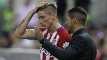 Torres y Simeone, durante un partido de este curso.
