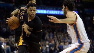 Feb 24, 2017; Oklahoma City, OK, USA; Los Angeles Lakers guard D'Angelo Russell (1) drives to the basket in front of Oklahoma City Thunder guard Alex Abrines (8) during the first quarter at Chesapeake Energy Arena. Mandatory Credit: Mark D. Smith-USA TODAY Sports