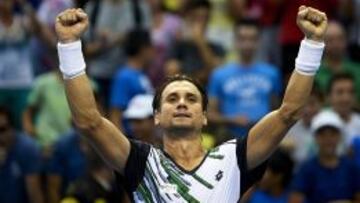 Ferrer celebra su victoria ante Bellucci.