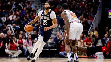 Nov 16, 2018; New Orleans, LA, USA; New Orleans Pelicans forward Anthony Davis (23) brings the ball up court against New York Knicks forward Noah Vonleh (32) in the second half at Smoothie King Center. Mandatory Credit: Stephen Lew-USA TODAY Sports
