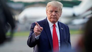 U.S. President Donald Trump speaks to the media before boarding Air Force One as he departs from Bedminster, New Jersey, U.S., August 9, 2020. REUTERS/Joshua Roberts