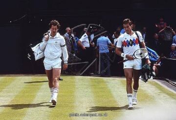 Tennis - 1983 Wimbledon Championship - Men's Singles Semi-Final  Ivan Lendl and John McEnroe walk onto Centre Court.  McEnroe won the match 7-6, 6-4, 6-4 to progress to the final.