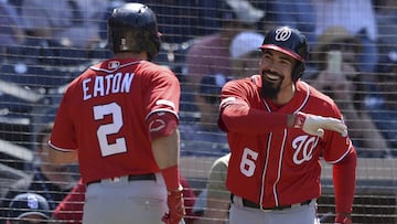Washington Nationals' Adam Eaton is congratulated by Anthony Rendon after hitting a home run during the eighth inning of a baseball game against the San Diego Padres, Sunday, June 9, 2019, in San Diego. (AP Photo/Orlando Ramirez)