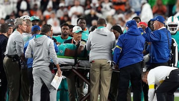 CINCINNATI, OHIO - SEPTEMBER 29: Medical staff tend to quarterback Tua Tagovailoa #1 of the Miami Dolphins as he is carted off on a stretcherafter an injury during the 2nd quarter of the game against the Cincinnati Bengals at Paycor Stadium on September 29, 2022 in Cincinnati, Ohio.   Dylan Buell/Getty Images/AFP