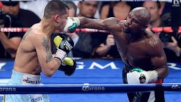 Mayweather retiene la corona tras una dura pelea con Maidana