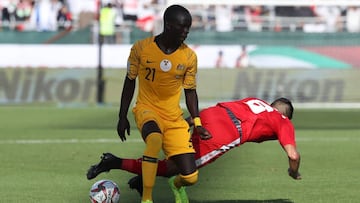 January 11, 2019 Australia&#039;s forward Awer Mabil (L) fights for the ball with Palestine&#039;s midfielder Jonathan Zorrilla during the 2019 AFC Asian Cup group B football match between Palestine and Australia at the Maktoum Bin Rashid Al-Maktoum Stadi