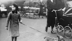 Princess Elizabeth exercising one of her Corgi dogs in London's Hyde Park.   (Photo by London Express/Getty Images)