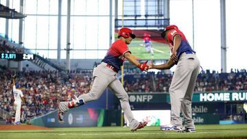 MIAMI, FL - MARCH 13: Juan Soto #22 of Team Dominican Republic celebrates with first base coach Julio Borbon #29 after hitting a home run in the sixth inning of Game 5 of Pool D between Team Dominican Republic and Team Nicaragua at loanDepot Park on Monday, March 13, 2023 in Miami, Florida. (Photo by Rob Tringali/WBCI/MLB Photos via Getty Images)