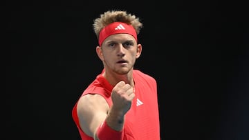 Spain's Alejandro Davidovich Fokina reacts after a point against Canada's Felix Auger-Aliassime during their men's singles match on day four of the Australian Open tennis tournament in Melbourne on January 16, 2025. (Photo by Paul Crock / AFP) / -- IMAGE RESTRICTED TO EDITORIAL USE - STRICTLY NO COMMERCIAL USE --