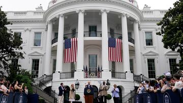 U.S. President Joe Biden and first lady Jill Biden host a July Fourth barbecue for active-duty U.S. military members and their families, with U.S. Defense Secretary Lloyd Austin and his wife Charlene Austin and the Reverend Dr. Robert Wright Lee IV in attendance, at the White House in Washington, U.S., July 4, 2024. REUTERS/Elizabeth Frantz