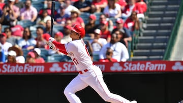 May 10, 2023; Anaheim, California, USA; Los Angeles Angels designated hitter Shohei Ohtani (17) hits a two run home run against the Houston Astros during the ninth inning at Angel Stadium. Mandatory Credit: Gary A. Vasquez-USA TODAY Sports