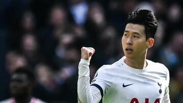 Tottenham Hotspur's South Korean striker #07 Son Heung-Min celebrates after shooting a penalty kick and scoring his team second goal during the English Premier League football match between Tottenham Hotspur and Arsenal at the Tottenham Hotspur Stadium in London, on April 28, 2024. (Photo by Ben Stansall / AFP) / RESTRICTED TO EDITORIAL USE. No use with unauthorized audio, video, data, fixture lists, club/league logos or 'live' services. Online in-match use limited to 120 images. An additional 40 images may be used in extra time. No video emulation. Social media in-match use limited to 120 images. An additional 40 images may be used in extra time. No use in betting publications, games or single club/league/player publications. / 