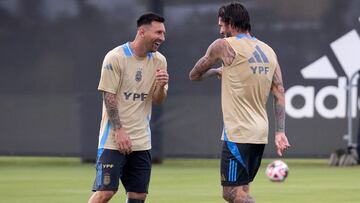FORT LAUDERDALE, FLORIDA - JUNE 5: (L-R) Lionel Messi and Rodrigo De Paul of Argentina laugh during a training session at Florida Blue Training Center on June 5, 2024 in Fort Lauderdale, Florida. Marco Bello/Getty Images/AFP (Photo by Marco Bello / GETTY IMAGES NORTH AMERICA / Getty Images via AFP)
