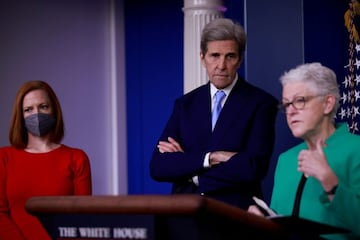 Press Secretary Jen Psaki and Special Presidential Envoy for Climate John Kerry look on as National Climate Advisor Gina McCarthy delivers remarks. 22 April 2021.