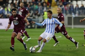 Horta e Insua durante el partido de vuelta de los dieciseisavos de final de la Copa del Rey que disputan esta noche en el estadio de La Rosaleda, en Málaga.