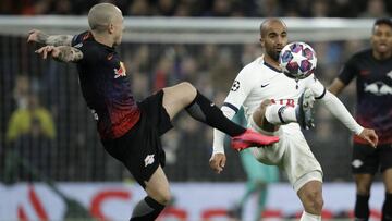 Tottenham&#039;s Lucas Moura, right, is challenged by Leipzig&#039;s Angelino during a first leg, round of 16, Champions League soccer match between Tottenham Hotspur and Leipzig at the Tottenham Hotspur Stadium in London, England, Wednesday Feb. 19, 2020