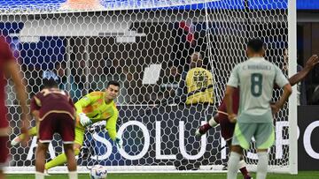 Venezuela's forward #23 Salomon Rondon (hidden) kicks to scores his team's first goal from the penalty spot during the Conmebol 2024 Copa America tournament group B football match between Venezuela and Mexico at SoFi Stadium in Inglewood, California on June 26, 2024. (Photo by Patrick T. Fallon / AFP)