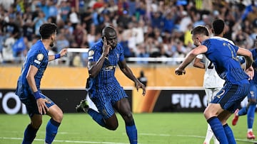Al Hilal's Senegalese defender #03 Kalidou Koulibaly (C) celebrates with teammates Saudi defender #78 Ali Lajami and Serbian midfielder #22 Sergej Milinkovic-Savic after scoring his team's third goal during the FIFA Club World Cup 2025 round of 16 football match between England's Manchester City and Saudi's Al-Hilal at the Camping World stadium in Orlando on June 30, 2025. (Photo by PATRICIA DE MELO MOREIRA / AFP)