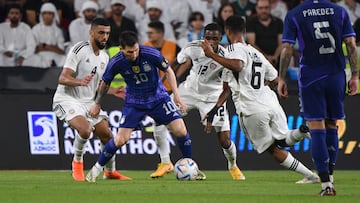 Argentina's forward Lionel Messi (2nd L) is marked by UAE players during the friendly football match between Argentina and the United Arab Emirates at the Mohammed Bin Zayed Stadium in Abu Dhabi, on November 16, 2022. (Photo by Ryan LIM / AFP)