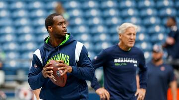 Seahawks coach Pete Carroll keeps Smith and Lock guessing