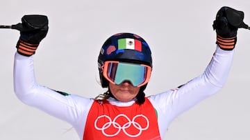 Mexico's Sarah Schleper reacts after competing in the women's super-G final during the Beijing 2022 Winter Olympic Games at the Yanqing National Alpine Skiing Centre in Yanqing on February 11, 2022. (Photo by Joe KLAMAR / AFP)