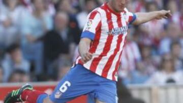 AL MANDO. Koke jugó un excelente partido ante el Granada. Lideró las operaciones en la medular.