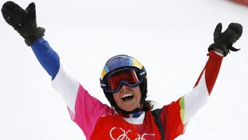 (FILES) In this file photo taken on February 23, 2006 Julie Pomagalski from France celebrates following the Turin 2006 Winter Olympics Ladies' Snowboard Parallel Giant Slalom race in Bardonecchia, Italy. - Former French snowboarding champion Julie Po