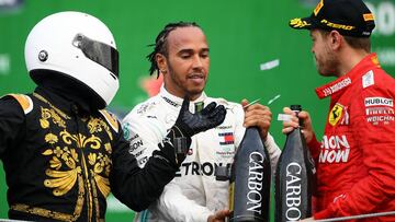 A Vettel le incomodó la presencia del animador en el podio.