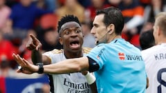 Soccer Football - LaLiga - Osasuna v Real Madrid - El Sadar Stadium, Pamplona, Spain - March 16, 2024 Real Madrid's Vinicius Junior appeals to referee Jose Munuera REUTERS/Vincent West