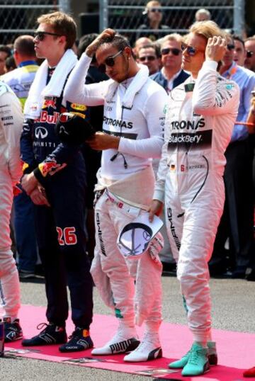 Daniil Kvyat, Lewis Hamilton y Nico Rosberg.