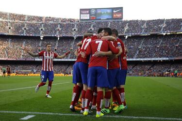 Barça edge feisty encounter to move clear at top of table