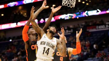 Dec 15, 2019; New Orleans, LA, USA; New Orleans Pelicans forward Brandon Ingram (14) is defended by Orlando Magic forward Jonathan Isaac (1) and center Nikola Vucevic (9) during the second half at the Smoothie King Center. Mandatory Credit: Derick E. Hingle-USA TODAY Sports TPX IMAGES OF THE DAY