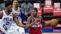 Jan 6, 2021; Philadelphia, Pennsylvania, USA; Washington Wizards guard Bradley Beal (3) drives against Philadelphia 76ers center Joel Embiid (21) during the first quarter at Wells Fargo Center. Mandatory Credit: Bill Streicher-USA TODAY Sports