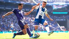 BARCELONA, SPAIN - SEPTEMBER 29: Adria Pedrosa of RCD Espanyol fights for the ball with Javi Moyano of Real Valladolid CF during the Liga match between RCD Espanyol and Real Valladolid CF at RCDE Stadium on September 29, 2019 in Barcelona, Spain. (Photo b