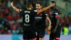 Rakitic celebra su gol con Jordán.