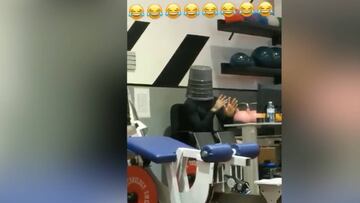 Dani Alves dancing with a bin on his head