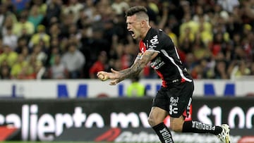 Brian Lozano of Atlas celebrates after scoring against America during their Mexican Clausura tournament football match at the Jalisco stadium in Guadalajara, Jalisco State, Mexico, on February 25, 2023. (Photo by Ulises Ruiz / AFP)