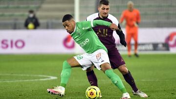 Saint-Etienne's French forward Arnaud Nordin (L) vies with Paris Saint-Germain's Italian midfielder Marco Verratti during the French L1 football match between Paris-Saint Germain (PSG) and Saint-Etienne, on January 6, 2021 at Geoffroy Guichard s