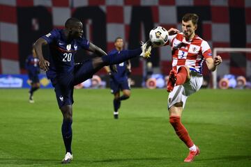 Ferland Mendy y Borna Barisic.